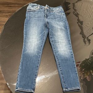 Women’s Mid Rise Medium Wash FlexX Skinny Jeans Express